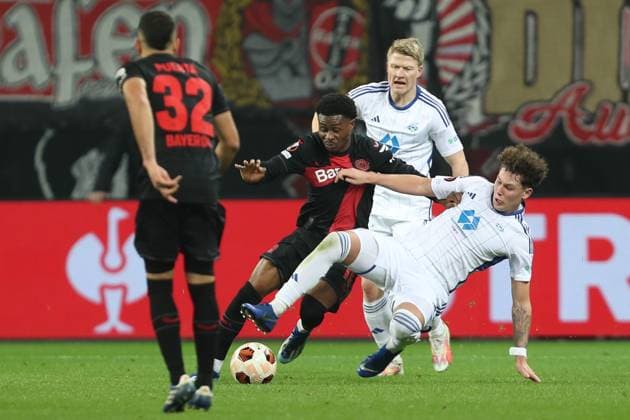 Germany, Leverkusen, 14 12 2023, BayArena, Bayer Leverkusen vs Molde FK UEFA Europa League 2023 2024 Group H, Nathan Tella Bayer 04 Bayer 04 Leverkusen and Mathias Fjortoft Lovik Molde FK battle for the ball Leverkusen BayArena North Rhine Westfalia Germany eu-images-678
