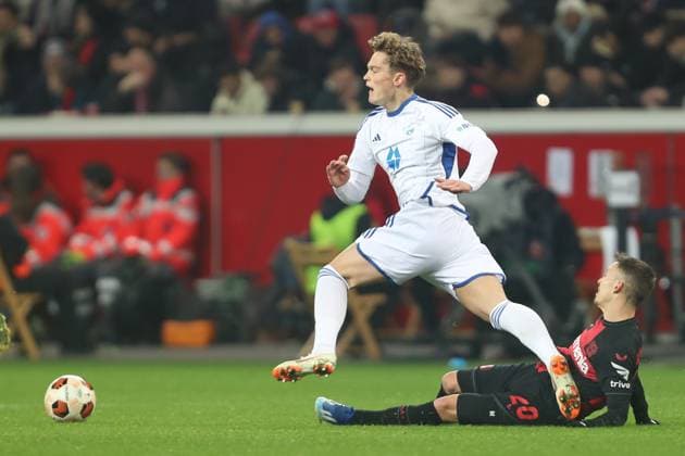 Germany, Leverkusen, 14 12 2023, BayArena, Bayer Leverkusen vs Molde FK UEFA Europa League 2023 2024 Group H, Gustav Nyheim Molde FK and Alejandro Grimaldo Bayer 04 Leverkusen battle for the ball Leverkusen BayArena North Rhine Westfalia Germany eu-images-678