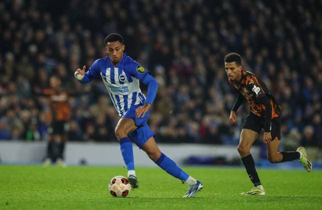Brighton and Hove Albion v Olympique de Marseille, Brighton, UK - 14 Dec 2023 Joao Pedro of Brighton and Hove Albion is pressured by Azzedine Ounahi of Olympique de Marseille during the Europa League match between Brighton and Hove Albion and Olympique de Marseille at The Amex Stadium, Brighton on 14 December 2023 ( Brighton The Amex Stadium Brighton England Copyright: xMicahxCrook PPAUKx PPA-075388