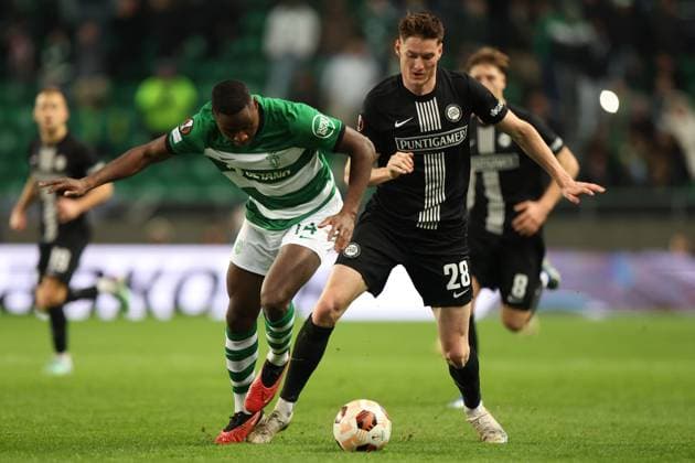 SOCCER - UEFA EL, Sporting vs Sturm LISBON,PORTUGAL,14.DEC.23 - SOCCER - UEFA Europa League, group stage, Sporting CP vs SK Sturm Graz. Image shows Dario Essugo (Sporting Lissabon) and David Schnegg (Sturm).  GEPAxpictures xChrisxBauer