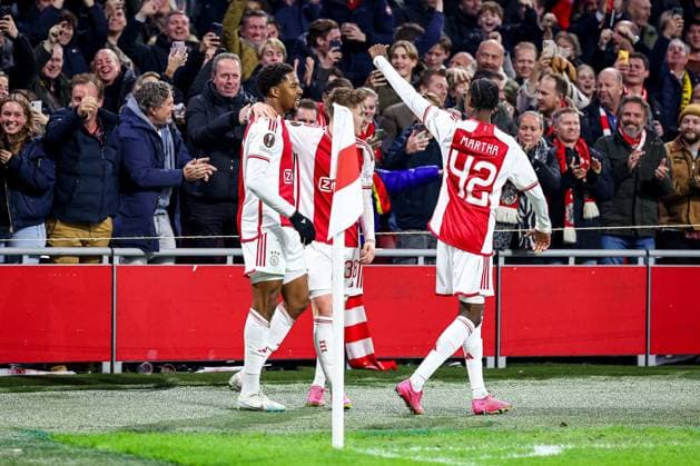 AMSTERDAM, 14-12-2023 , JohanCruyff Arena, Europa League Football season 2023 2024. Ajax player Chuba Akpom scores the 3-1 and celebrates with Ajax player Ar Jany Martha (r) and Ajax player Kristian Hlynsson (m) during the match Ajax - AEK Athens. Ajax - AEK Athens  x23521587x Copyright: