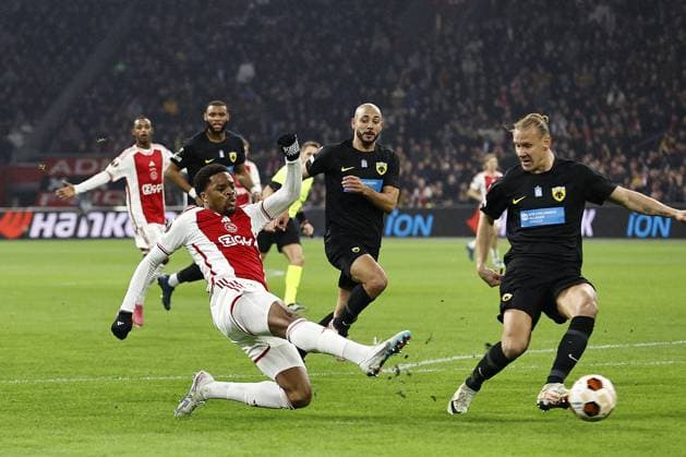 AMSTERDAM - (l-r) Chuba Akpom of Ajax scores the 3-1, Nordin Amrabat of AEK Athens, Domagoj Vida of AEK Athens during the UEFA Europa League match in group B between Ajax Amsterdam and AEK Athene FC in the Johan Cruyff ArenA on December 14 2023 in Amsterdam, Netherlands. ANP MAURICE VAN STEEN UEFA Europa League 2023 24 2023 2024 xVIxANPxSportx xxANPxIVx 486308656 originalFilename: 486308656.jpg