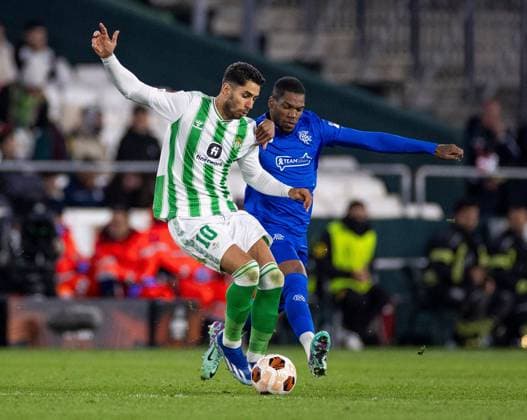 Rangers Defender Dujon Sterling in action with Ayoze Perez of Real Betis during the Europa League Group C match at the Estadio Benito Villamarin, Seville. Real Betis v Rangers, UEFA Europa League, Group C, Football, Benito VillamaroÆ?Ã?Ân Stadium, Seville, Spain - 14 Dec 2023 EDITORIAL USE ONLY No use with unauthorised audio, video, data, fixture lists, club league logos or live services. Online in-match use limited to 120 images, no video emulation. No use in betting, games or single club league player publications. Copyright: xKirkxO Rourke RangersxFC Shutterstockx 14257803du