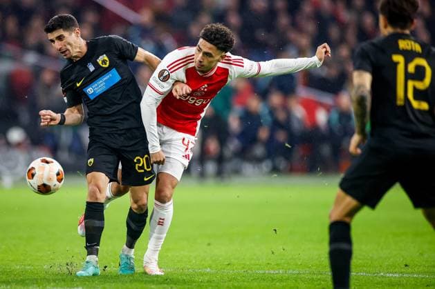 AMSTERDAM, 14-12-2023 , JohanCruyff Arena, Europa League Football season 2023 2024. Ajax player Tristian Gooijer (r) and AEK Athene player Petros Mantalos (l) during the match Ajax - AEK Athens. Ajax - AEK Athens  x23521737x Copyright:
