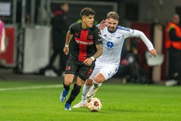 GER, EL, Bayer 04 Leverkusen vs Molde FK, Season 2023 24, 14 12 2023, BayArena, Leverkusen, GER, EL, Bayer 04 Leverkusen vs Molde FK, Season 2023 24, In the picture Piero Hincapie Bayer 04 Leverkusen, 03 Ball on foot in duel, Duel, Dynamics, Action, Action, Match scene Niklas Odegard Nolde FK, 33 Gestures, Facial expressions, Emotions nordphotoxGmbHxx xDenkinger nph00015