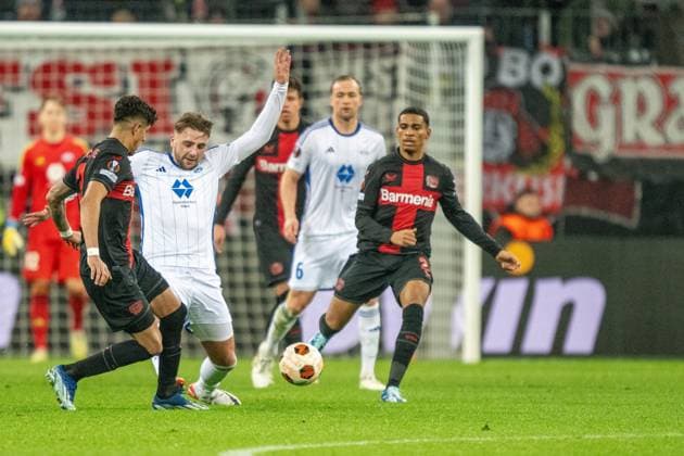 GER, EL, Bayer 04 Leverkusen vs Molde FK, Season 2023 24, 14 12 2023, BayArena, Leverkusen, GER, EL, Bayer 04 Leverkusen vs Molde FK, Season 2023 24, In the picture Niklas Odegard Molde FK, 33 attacks Piero Hincapie Bayer 04 Leverkusen, 03 ball on foot in duel, duel, dynamics, action, action, game scene nordphotoxGmbHxx xDenkinger nph00015