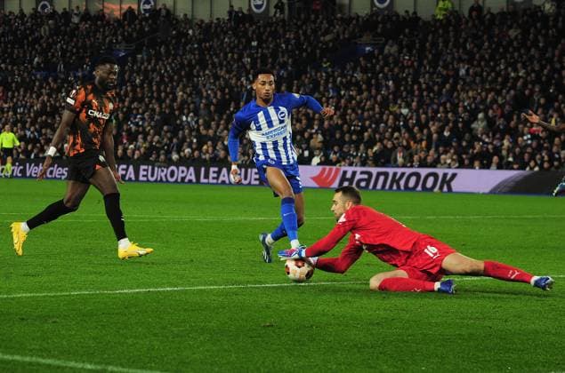 Football - 2023 2024 UEFA Europa League - Group B - Match day Six Six - Brighton & Hove Albion vs Marseille - Amex Stadium - Thursday 14th December 2023. Joao Pedro of Brighton challenges Goalkeeper, Pau Lopez 