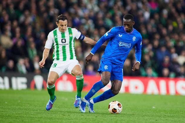 December 14, 2023, SEVILLA, SEVILLA, SPAIN: Andres Guardado of Real Betis and Abdallah Sima of Rangers FC in action during the UEFA Europa League, Group C, match between Real Betis and Rangers FC at Benito Villamarin stadium on December 14, 2023 in Sevilla, Spain. SEVILLA SPAIN - ZUMAa181 20231214_zaa_a181_089 Copyright: xJoaquinxCorcherox