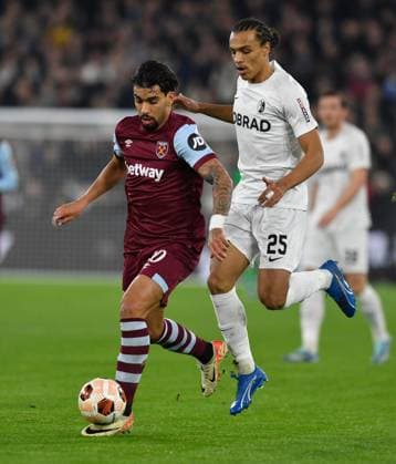 Lucas Paqueta of West Ham United in action with Kiliann Sildillia of Freiburg West Ham United v Freiburg, UEFA Europa League, Group A, Football, London Arena, London, UK - 14 Dec 2023 EDITORIAL USE ONLY No use with unauthorised audio, video, data, fixture lists, club league logos or live services. Online in-match use limited to 120 images, no video emulation. No use in betting, games or single club league player publications. Copyright: xAlanxWalter Shutterstockx 14254269ck