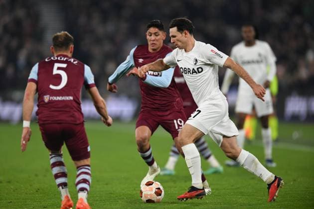 Nicholas Hofler of SC Freiburg with the ball during the UEFA Europa League match between West Ham United and SC Freiburg at the London Stadium, Queen Elizabeth Olympic Park , London, England on 14 December 2023. Copyright: xPhilxHutchinsonx 39240059