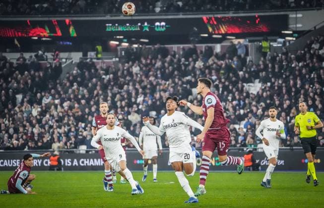 West Ham United SC Freiburg Football UEFA Europa League 2023 2024, Matchday 6, West Ham United SC Freiburg, London Stadium Scene l r West Hams Nayef Aguerd on the ground, Freiburgs Lucas Höler and Freiburgs Junior Adamu with West Hams Konstantinos Mavropanos
