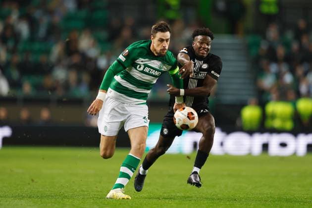 (L-R) Sebastian Coates (SportingCP), Seedy Jatta (Graz), DECEMBER 14, 2023 - Football Soccer : UEFA Europa League group D matchday6 between Sporting Clube de Portugal 3-0 SK Sturm Graz at the Estadio Jose Alvalade in Lisbon, Portugal. Noxthirdxpartyxsales  (238483446)