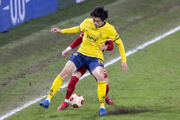 Union Saint-Gilloise defender Koki Machida (28) battles with Liverpool midfielder Harvey Elliott (19) during the Europa League match between Royale Union Saint Gilloise and Liverpool at Lotto Park, Anderlecht, Belgium on 14 December 2023. Noxthirdxpartyxsales  (238451837)