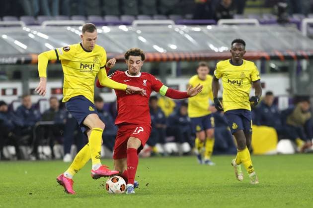 231214 Royale Union Saint-Gilloise vs Liverpool FC Curtis Jones of Liverpool battles for the ball with Gustaf Nilsson of Union during a football game between Royale Union Saint-Gilloise and Liverpool FC on day 6 in Group E of the UEFA Europa League season 2023-2024 competition on December 14, 2023 in Brussels, Belgium. (Photo by Frank Abbeloos Isosport) BRUSSELS BELGIUM  Copyright: xx 424905