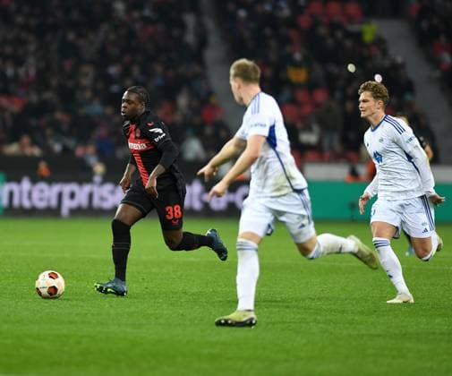 14 12 2023, Leverkusen, Germany, BayARENA, Bayer Leverkusen vs Molde FK UEFA Europa League 2023 2024 Group H, Ken Izekor Bayer 04 Leverkusen in action, on the ball, single action Photo Ralf Treese Leverkusen BayARENA North Rhine Westphalia Germany 521_LEVMOL20231214_036 Treese-521