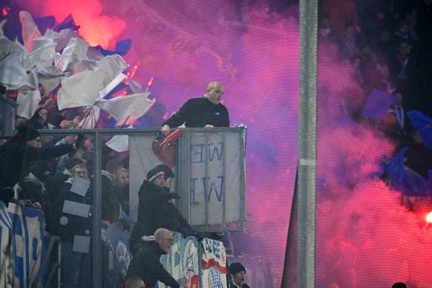 Paderborn, Home Deluxe Arena, 15 12 23, GER, Herren, 2 Bundesliga, Saison 2023 2024, SC Paderborn 07 FC Hansa Rostock Bild Fankurve, Fans, Fanblock Rostock mit Feuer, Rauch, Bengali, Bengalis, bengalisches Feuer, zuenden Feuerwerk, Rauchbombe Only for editorial use DFL regulations prohibit any use of photographs as image sequences and or quasi video NRW Deutschland