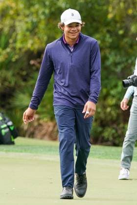December 15, 2023, Orlando, Florida, USA: Charlie Woods walks off the 9th green during the 2023 PNC Championship Pro-Am at Ritz-Carlton Golf Club. Orlando USA - ZUMAw109 20231215_fap_w109_009 Copyright: xDebbyxWongx