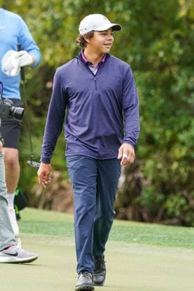 December 15, 2023, Orlando, Florida, USA: Charlie Woods walks off the 9th green during the 2023 PNC Championship Pro-Am at Ritz-Carlton Golf Club. Orlando USA - ZUMAw109 20231215_fap_w109_018 Copyright: xDebbyxWongx