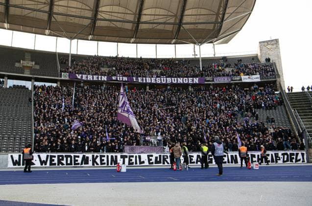 Soccer, Men, Season 2023 2024, 2 Bundesliga 17 Matchday , Hertha BSC VfL Osnabrück, Fans of Osnabrück with banner in the guest block, We will not be part of your deal fuck DFL , 16 12 2023, Copyright: xSebastianxRäppold MatthiasxKochx