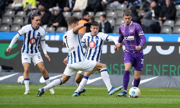 Florian Niederlechner, Gustav Christensen, Michaël Cuisance duel Match scene Action Sport Football Soccer DFL 2 Bundesliga Men 17 Matchday Season 2023 2024 16 12 2023 Hertha BSC Berlin vs VfL Osnabrück DFL regulations prohibit any use of photographs as image sequences and or quasi video