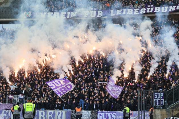 DEU, DFL, 2 FBL, Hertha BSC vs VFL Osnabrueck, 16 12 2023, Berliner Olympiastadion, Berlin, DEU, DFL, 2 FBL, Hertha BSC vs VFL Osnabrueck, im Bild Osnabrueck Fanblock, Pyro DFL regulations prohibit any use of Photographs as image sequences and or quasi video Foto Juergen Engler nordphoto GmbH nordphotoxGmbHx xEngler nph00076