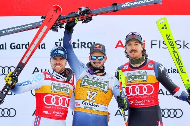 Sport Themen der Woche KW50 ALPINE SKIING - FIS WC Val Gardena VAL GARDENA,ITALY,16.DEC.23 - ALPINE SKIING - FIS World Cup, downhill, men. Image shows the rejoicing of Aleksander Aamodt Kilde (NOR), Dominik Paris (ITA) and Bryce Bennett (USA).  GEPAxpictures xThomasxBachun