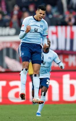 Bild Torschuetze Robert Glatzel Hamburger SV, 9 und Jean Luc Dompe Hamburger SV, 27 Jubel nach dem Tor zum 1 0, jubelnd, bejubelt, jubelt, jubeln, emotionen l r 16 12 2023, Fussball, 2 Bundesliga, 1 FC Nürnberg Hamburger SV, GER, Nuernberg, Max Morlock Stadion, DFL REGULATIONS PROHIBIT ANY USE OF PHOTOGRAPHS AS IMAGE SEQUENCES AND OR QUASI VIDEO Copyright: HMBxMedia xHeikoxBecker