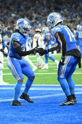DETROIT, MI - DECEMBER 16: Detroit Lions RB Jahmyr Gibbs (26) celebrates his touchdown with Detroit Lions WR Amon-Ra St. Brown (14) during the game between Denver Broncos and Detroit Lions on December 16, 2023 at Ford Field in Detroit, MI ( CSM) Detroit United States - ZUMAc04_ 20231216_zma_c04_354 Copyright: xAllanxDranbergx