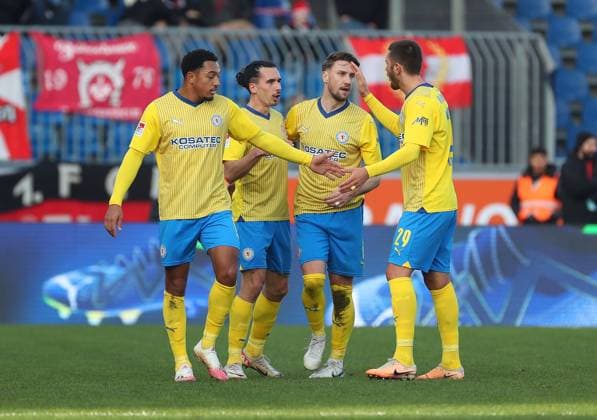 Braunschweig vs Kaiserslautern, 2 BL Braunschweig, 17 12 2023, FOOTBALL Eintracht Braunschweig vs 1 FC Kaiserslautern, 2 BL, Season 2023 24 Rayan Philippe Eintracht Braunschweig celebrates with teammates after his goal to make it 1 1 Braunschweig