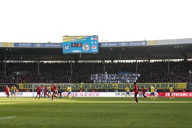 Fan protest in the Eintracht Braunschweig fan block against investors in the DFL 2 Bundesliga season 2023 2024 Eintracht Braunschweig vs 1 FC Kaiserslautern at the Eintracht Stadium in Braunschweig Football,Man,Men,Germany,17 12 2023