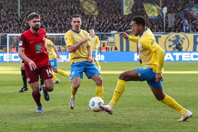 Rayan Philippe Eintracht Braunschweig,9 and Anton Donkor Eintracht Braunschweig,19 vs Nikola Soldo 1 FC Kaiserslautern,14 2 Soccer Bundesliga Season 2023 2024 Eintracht Braunschweig vs 1 FC Kaiserslautern at Eintracht Stadium in Braunschweig Action,Soccer,Man,Men,Germany,17 12 2023