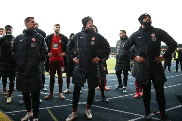 Hendrick Zuck 1 FC Kaiserslautern,21 and Terrence Boyd 1 FC Kaiserslautern,13 The team of 1 FC Kaiserslautern stands in front of the fan block after the match 2 Soccer Bundesliga Season 2023 2024 Eintracht Braunschweig vs 1 FC Kaiserslautern at Eintracht Stadium in Braunschweig Action,Soccer,Man,Men,Germany,17 12 2023