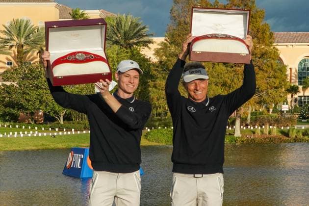 December 17, 2023, Orlando, Florida, USA: Bernhard Langer (R) and son, Jason, hold the Willie Park trophies after winning the final round of the 2023 PNC Championship at Ritz-Carlton Golf Club. Orlando USA - ZUMAw109 20231217_fap_w109_037 Copyright: xDebbyxWongx