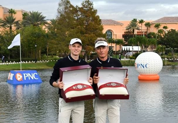 Final Round of PNC Championship in Orlando, US - 17 Dec 2023 Bernhard Langer (R) and his son, Jason Langer (L) pose with their trophies following the final round of the PNC Championship at the Ritz-Carlton Golf Club in Orlando. Orlando United States Copyright: xPaulxHennessyx xSOPAxImagesx 12172023_PHH_PNC_21