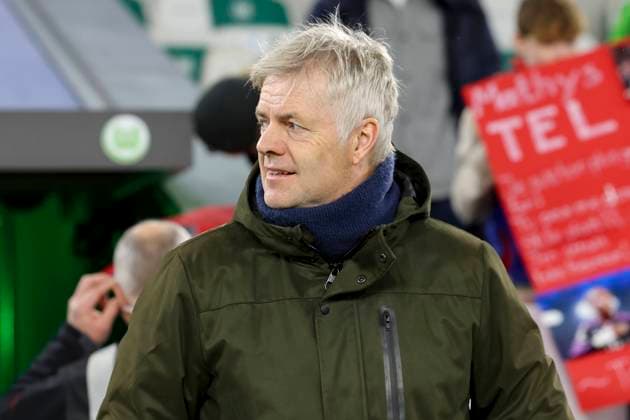 Germany, Wolfsburg, 20 12 2023, Volkswagen Arena, VfL Wolfsburg vs FC Bayern Muenchen 1 Bundesliga, Commentator Tom Bartels Das Erste looks on Wolfsburg Volkswagen Arena Germany eu-images-108