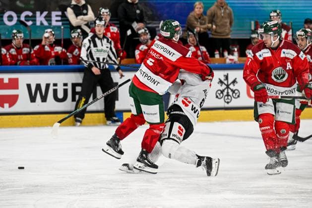 26 12 2023, Davos, Eisstadion Davos, Spengler Cup Frölunda HC Team Canada, 6 Filip Hasa Frölunda against 96 Daniel Audette Team Canada Davos Eisstadion Davos Graubünden Switzerland Copyright: xJustPictures.ch AndreaxBrancax jp-en-AnBr-AB_26122023_AAB_3141