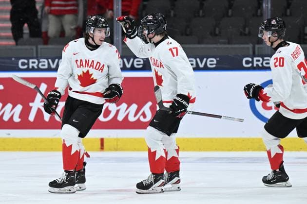 GOTHENBURG, SWEDEN 20231227 Canada s 29 Brayden Yager celebrates after scoring 0 2 with team mates Macklin Celbrini and Carson Rehkopf during the IIHF World Junior Championship group A ice hockey match between Latvia and Canada at Scandinavium in Gothenburg, Sweden December 27, 2023 GOTHENBURG SWEDEN x9200x  Copyright: xBjörnxLarssonxRosvall TT TTx IIHF World Junior Championship 23-24 Latvia-Canada