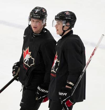 December 30, 2023, GOTHENBURG, SWEDEN: Canada s Jake Furlong, left, and Oliver Bonk talk together during a practice session at the IIHF World Junior Hockey Championship in Gothenburg, Sweden on Saturday, Dec. 30, 2023. Canada News - December 30, 2023  - ZUMAc35_ 20231230_zaf_c35_001 Copyright: xChristinnexMuschix