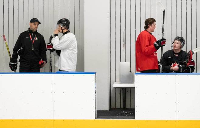 December 30, 2023, GOTHENBURG, SWEDEN: Canada head coach Alan Letang, left to right, talks to Matthew Poitras as Fraser Minten and Ty Nelson are the last off the ice during a practice session at the IIHF World Junior Hockey Championship in Gothenburg, Sweden on Saturday, Dec. 30, 2023. Canada News - December 30, 2023  - ZUMAc35_ 20231230_zaf_c35_008 Copyright: xChristinnexMuschix