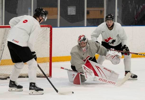 December 30, 2023, GOTHENBURG, SWEDEN: Canada s Nate Danielson (9) and Easton Cowan (27) conduct a drill with goaltender Samuel St-Hilaire during a practice session at the IIHF World Junior Hockey Championship in Gothenburg, Sweden on Saturday, Dec. 30, 2023. Canada News - December 30, 2023  - ZUMAc35_ 20231230_zaf_c35_014 Copyright: xChristinnexMuschix