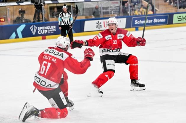 30 12 2023, Davos, Eisstadion Davos, Spengler Cup HC Dynamo Pardubice Team Canada, 33 Jan Kostalek Dynamo Pardubice and 61 Martin Kaut Dynamo Pardubice celebrate a goal Davos Eisstadion Davos Graubünden Switzerland Copyright: xJustPictures.ch AndreaxBrancax jp-en-AnBr-AB_30122023_AAB_6266