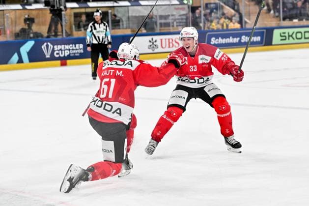 30 12 2023, Davos, Eisstadion Davos, Spengler Cup HC Dynamo Pardubice Team Canada, 33 Jan Kostalek Dynamo Pardubice and 61 Martin Kaut Dynamo Pardubice celebrate a goal Davos Eisstadion Davos Graubünden Switzerland Copyright: xJustPictures.ch AndreaxBrancax jp-en-AnBr-AB_30122023_AAB_6269