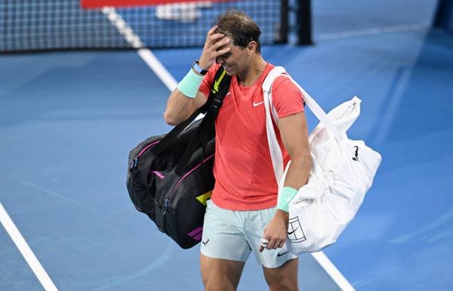 TENNIS BRISBANE INTERNATIONAL, Rafael Nadal of Spain reacts after losing his doubles match with partner Marc Lopez of Spain against Max Purcell and Jordan Thompson of Australia during their round 1 doubles match on Day 1 of the 2024 Brisbane International at the Queensland Tennis Centre in Brisbane, Sunday, December 31, 2023. ( NO ARCHIVING, EDITORIAL USE ONLY, NO USE IN BOOKS WITHOUT CONSENT BRISBANE QUEENSLAND AUSTRALIA  Copyright: xDARRENxENGLANDx 20231231001883589851