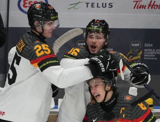 December 31, 2023, GOTHENBURG, SWEDEN: Germany s Julian Lutz (8) celebrates his goal over Canada with teammates Lennard Nieleck (25) and Ralf Rollinger (16) during first period hockey action at the IIHF World Junior Hockey Championship in Gothenburg, Sweden, Sunday, Dec. 31, 2023. Canada News - December 31, 2023  - ZUMAc35_ 20231231_zaf_c35_004 Copyright: xChristinnexMuschix