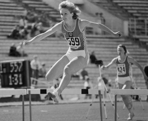 Moscow, USSR. The winner of the race Soviet athlete Olga Nazarova (front) who took first place with a result of 55.80 seconds runs the 400-meter hurdles race at the Central Lenin Stadium as part of the 33th Memorial of the Znamensky Brothers. Alexander Yakovlev TASS  17940572