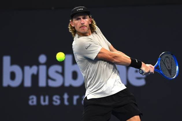 TENNIS BRISBANE INTERNATIONAL, Max Purcell in action against Holger Rune during their round 1 match on Day 2 of the 2024 Brisbane International at the Queensland Tennis Centre in Brisbane, Monday, January 1, 2024. NO ARCHIVING, EDITORIAL USE ONLY, NO USE IN BOOKS WITHOUT CONSENT BRISBANE QUEENSLAND AUSTRALIA  Copyright: xJONOxSEARLEx 20240101001883879091