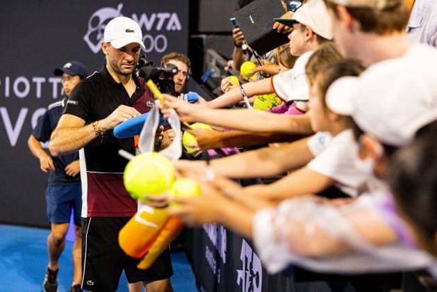 Grigor Dimitrovsigns for the fans after his win in the first round of the Brisbane International 1st January 2024 Brisbane International Tennis Tournament, Day Two, Queensland Tennis Centre, Brisbane, Australia - 01 Jan 2024  Copyright: xBenxSymons Shutterstockx 14279941et