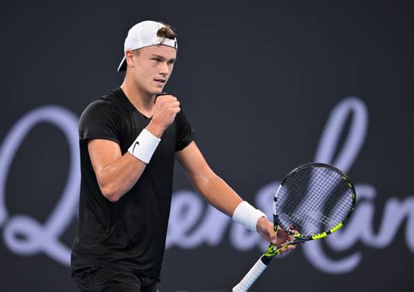 TENNIS BRISBANE INTERNATIONAL, Holger Rune of Denmark in action against James Duckworth of Australia during their match on Day 6 of the 2024 Brisbane International at the Queensland Tennis Centre in Brisbane, Friday, January 5, 2024. ( NO ARCHIVING, EDITORIAL USE ONLY, NO USE IN BOOKS WITHOUT CONSENT BRISBANE QUEENSLAND AUSTRALIA  Copyright: xZAINxMOHAMMEDx 20240105001885094085