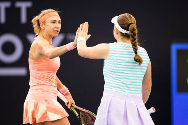 Lyudmyla Kichnok and Jelena Ostapenko in action in the womens doubles final Brisbane international 6th January 2024 Brisbane International Tennis Tournament, Day Seven, Queensland Tennis Centre, Brisbane, Australia - 06 Jan 2024  Copyright: xBenxSymons Shutterstockx 14286930be
