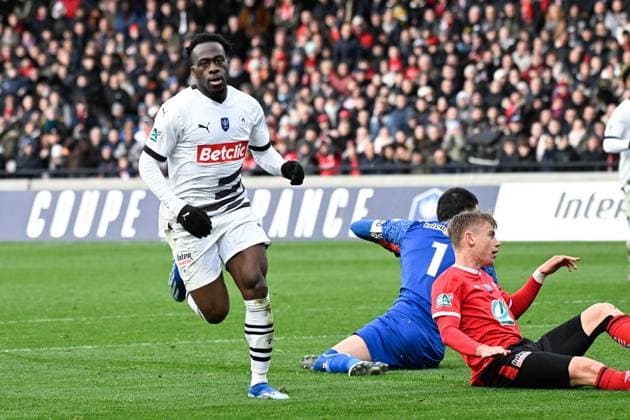 Kalimuendo Arnaud ( 9 - Rennes ) celebrates during the French Cup match between EA Guingamp and Stade Rennais at Stade du Roudourou on January 07, 2024 in Guingamp, France. ( Photo by federico pestellini panoramic ) - FOOTBALL : Guingamp vs Rennes - Coupe de France - 07 01 2024 FedericoPestellini Panoramic 